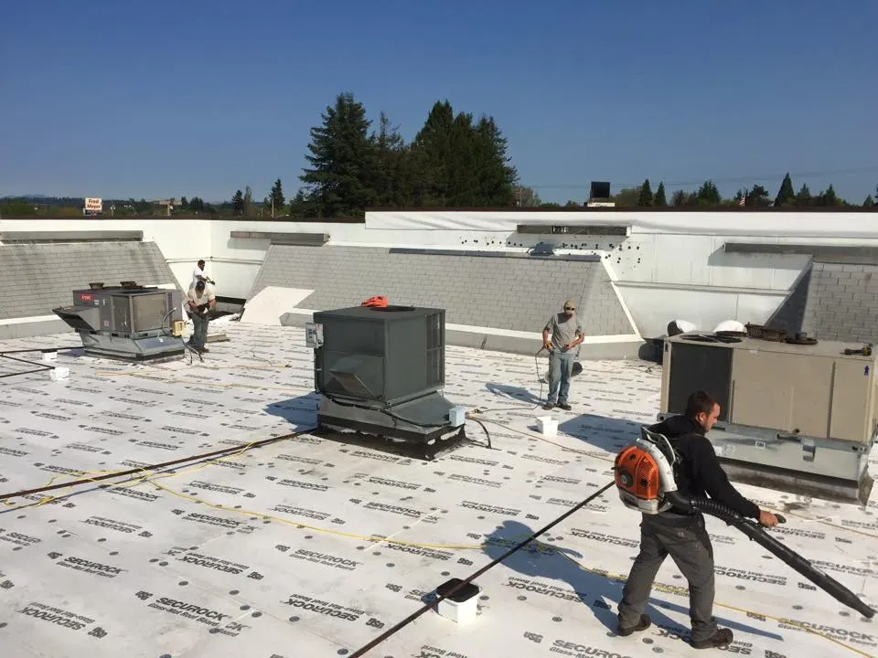 Commercial low-slope roof with HVAC units